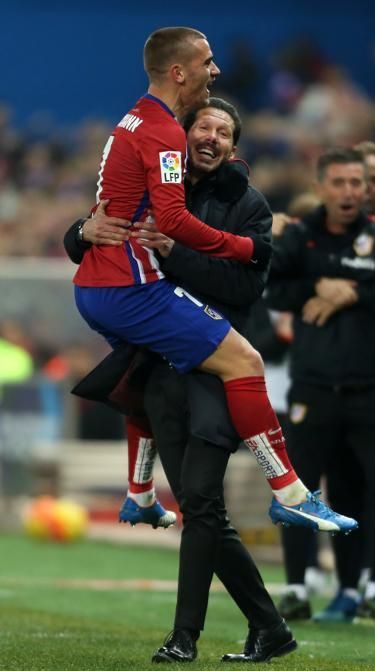 Griezmann celebra con el Cholo el gol que suponía la remontada